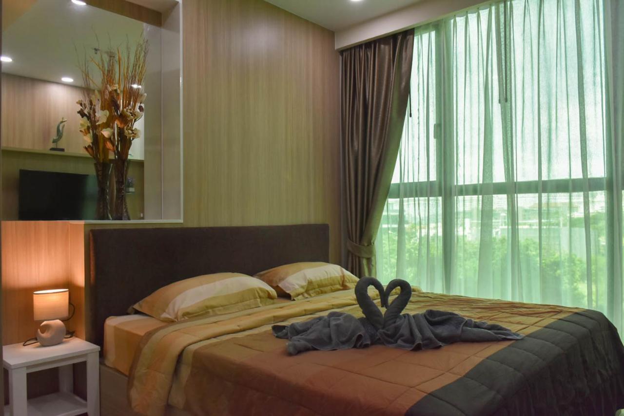Dusit Grand Condo View Praia de Jomtien Quarto foto